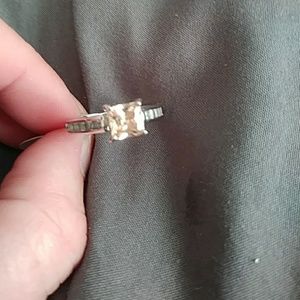 Silver ring with peach colored stone